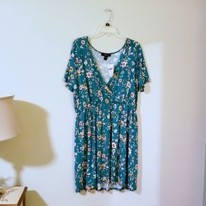 Green floral knit dress with low neckline